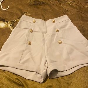 Tan shorts gold buttons side zipper
